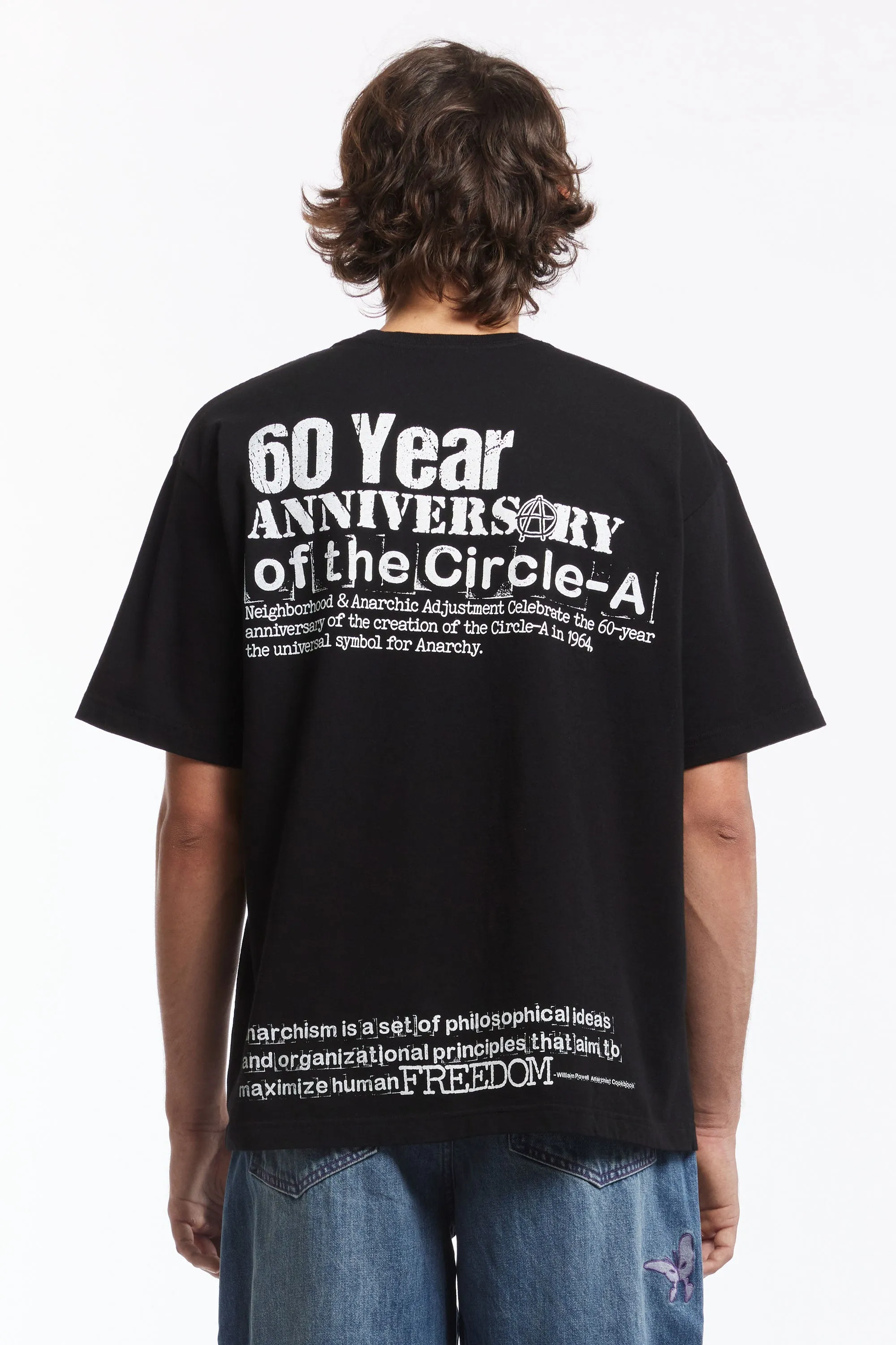 NH X ANARCHIC ADJUSTMENT . TEE SS-1 BLACK